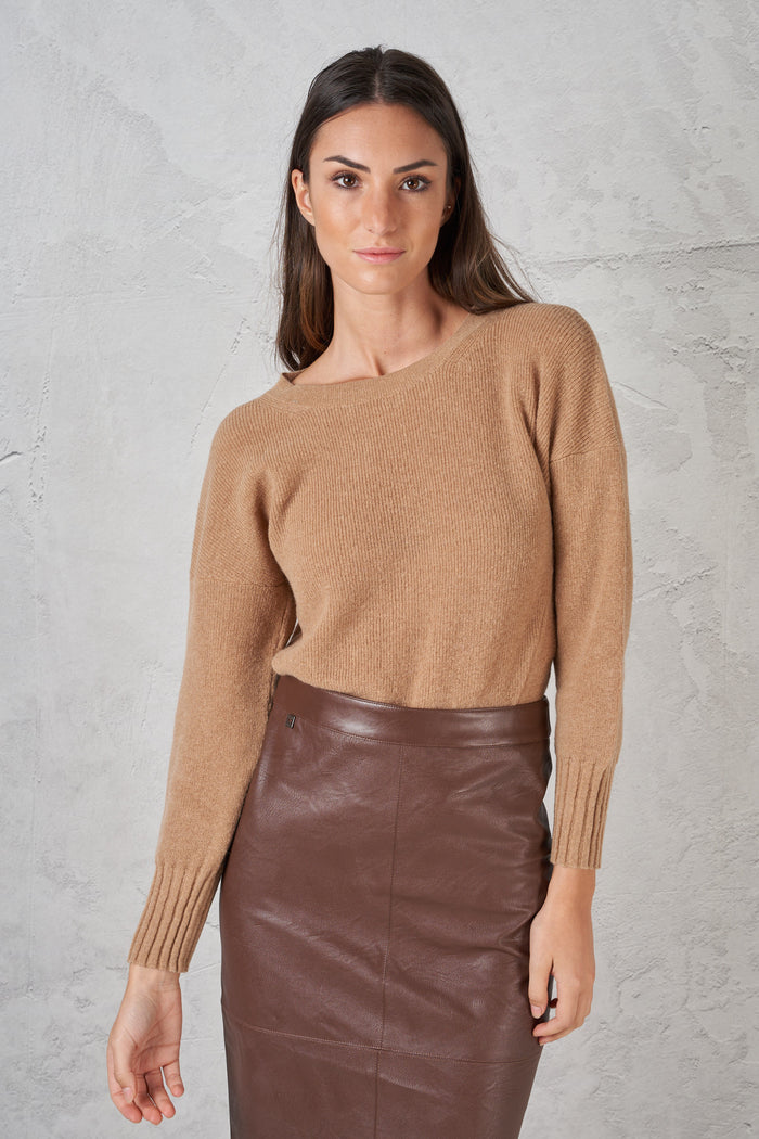 Asymmetric sweater with slits