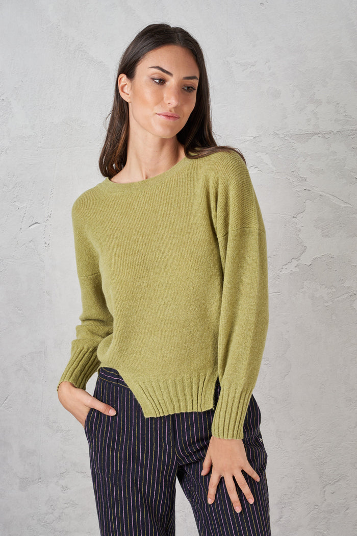 Asymmetric sweater with slits