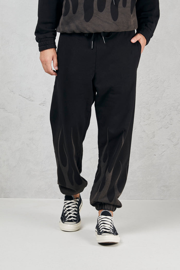Trousers with lasered flames