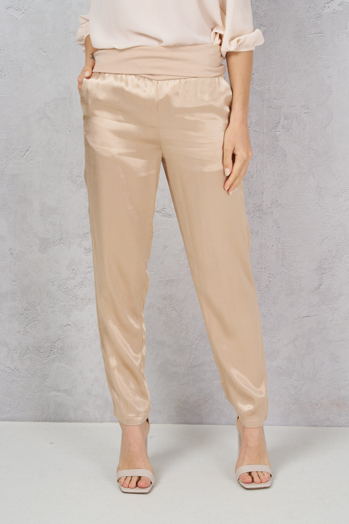 Solid color trousers with peplum
